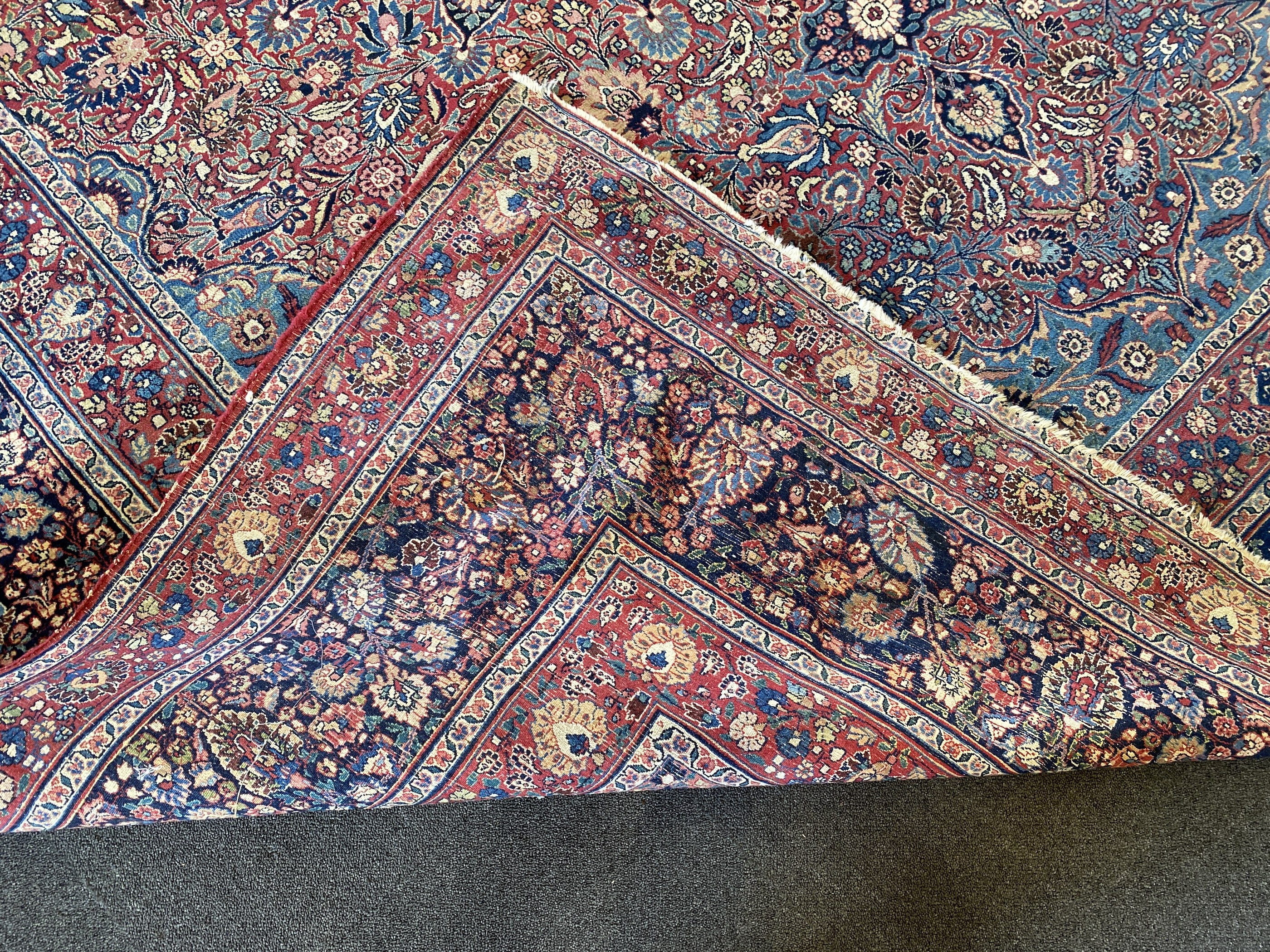 A North West Persian blue ground carpet